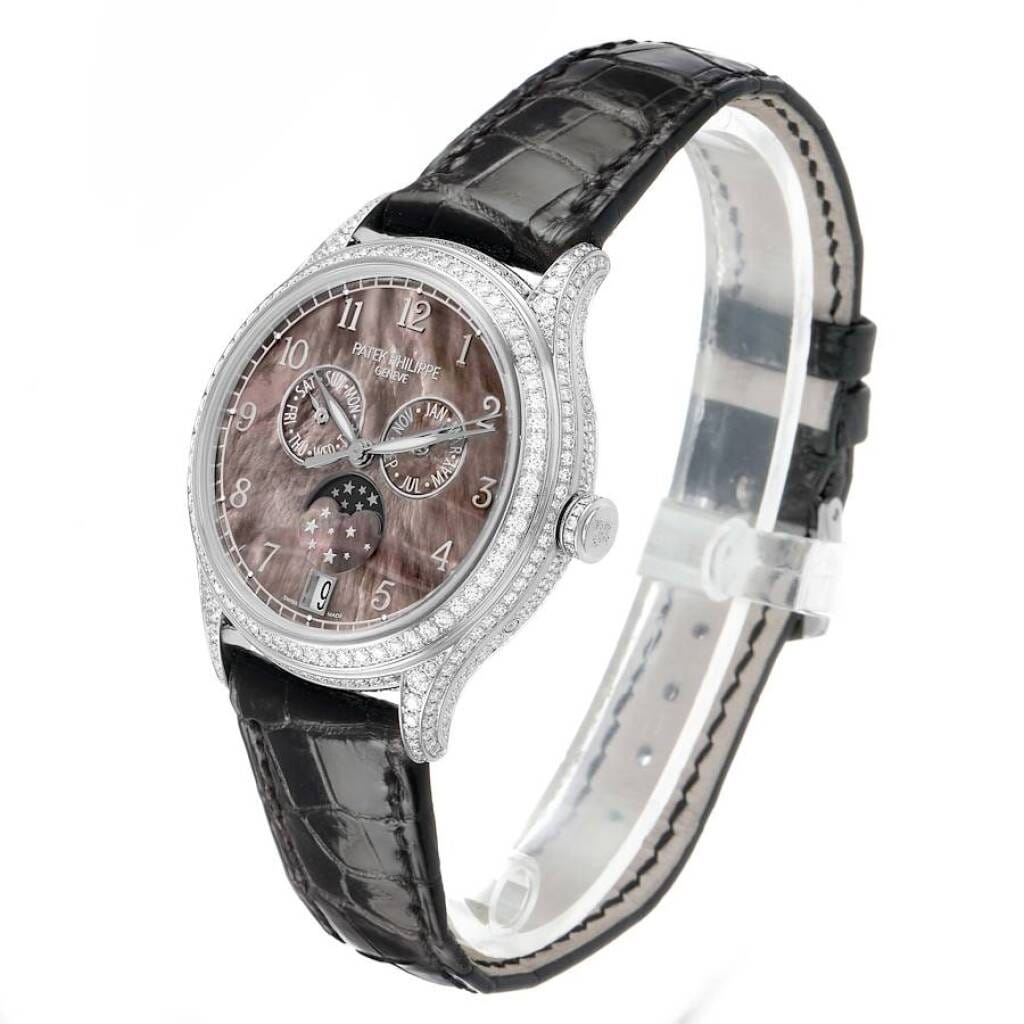 Complications (Reference 4948G). A 38mm white gold diamond-set automatic wristwatch with date, day, month, moon phase, and annual calendar.