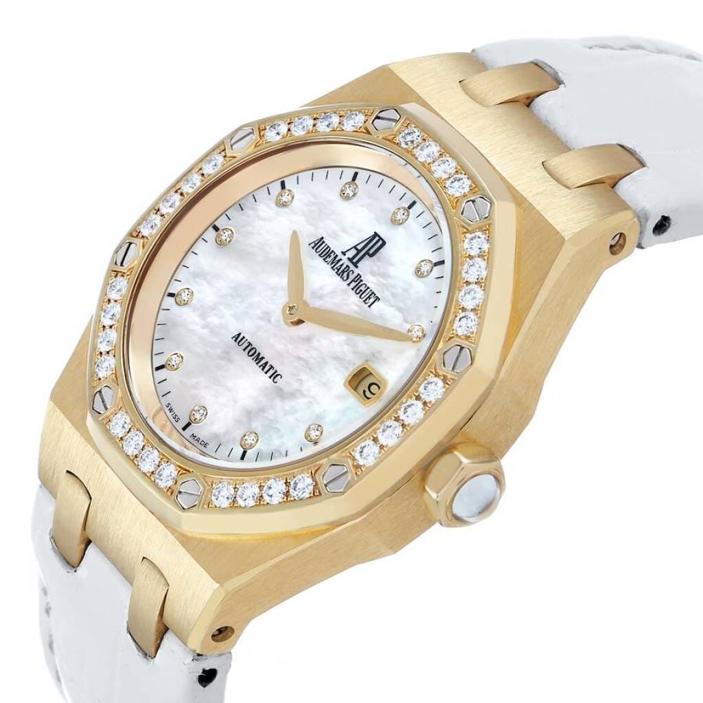 Lady Royal Oak (Reference 77321). A 33mm yellow gold diamond-set quartz wristwatch with date.