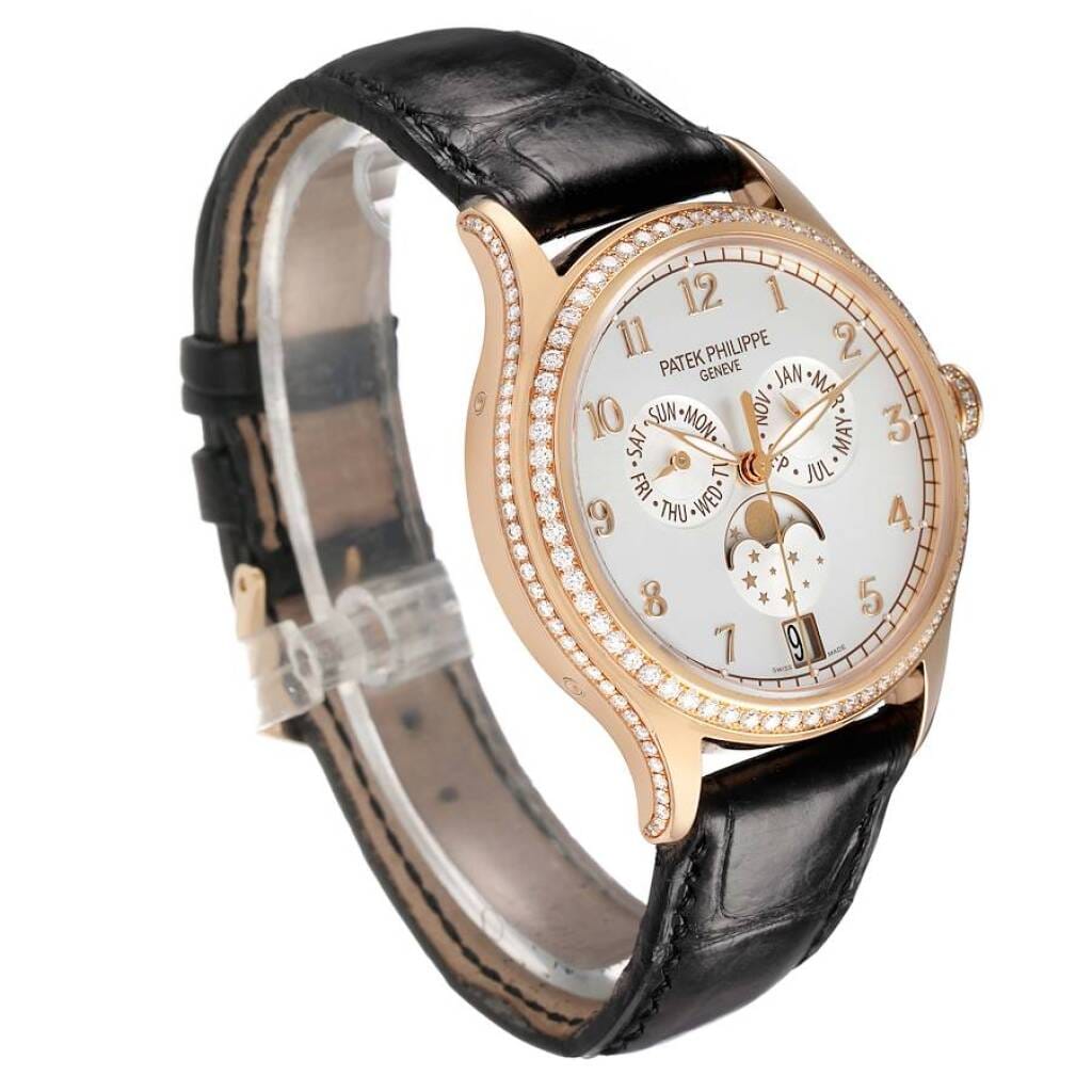 Complications (Reference 4947R-001). A 38mm rose gold diamond-set automatic wristwatch with date, day, month, moon phase, and annual calendar. 2022