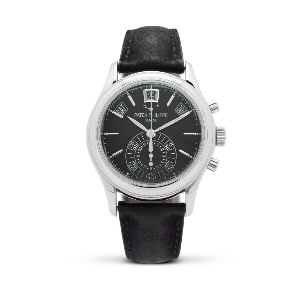 Complications (Reference 5960P-016). A 40mm platinum automatic wristwatch with day, date, month, chronograph, 12 hour-counter, power reserve, day/night indicator, and annual calendar.