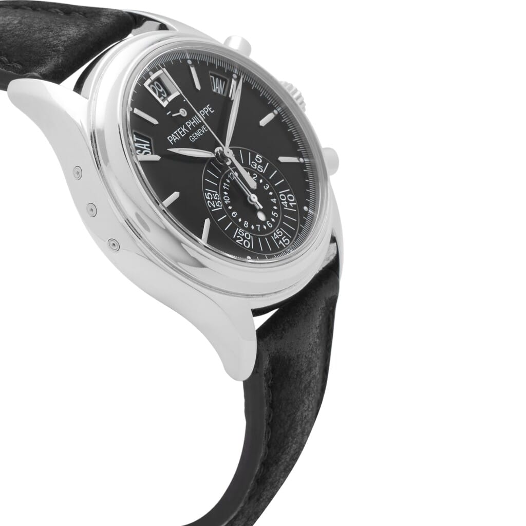 Complications (Reference 5960P-016). A 40mm platinum automatic wristwatch with day, date, month, chronograph, 12 hour-counter, power reserve, day/night indicator, and annual calendar.