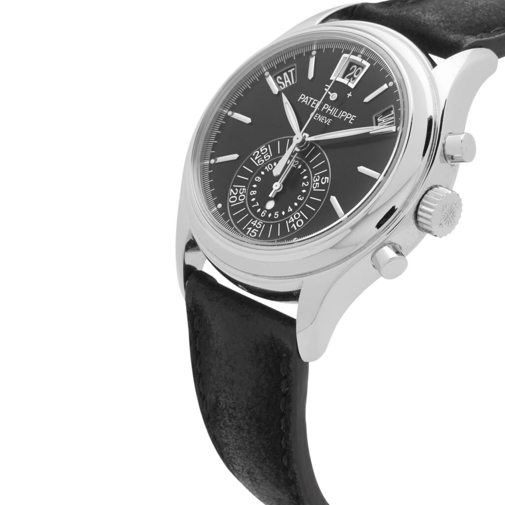 Complications (Reference 5960P-016). A 40mm platinum automatic wristwatch with day, date, month, chronograph, 12 hour-counter, power reserve, day/night indicator, and annual calendar.