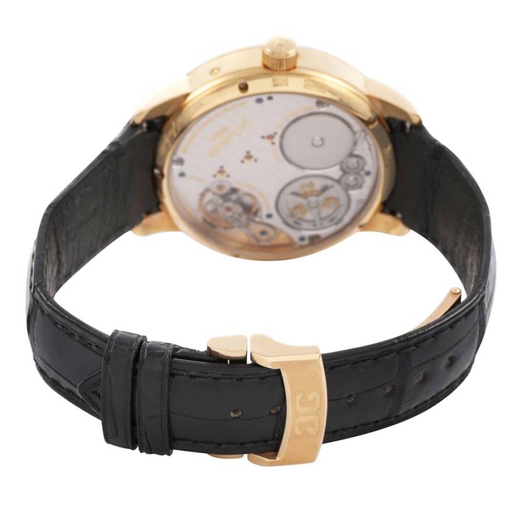 Senator Chronometer (Reference 1-58-01-01-01-04). A 42mm yellow gold manual wind wristwatch with date, power reserve, and day/night indicator.