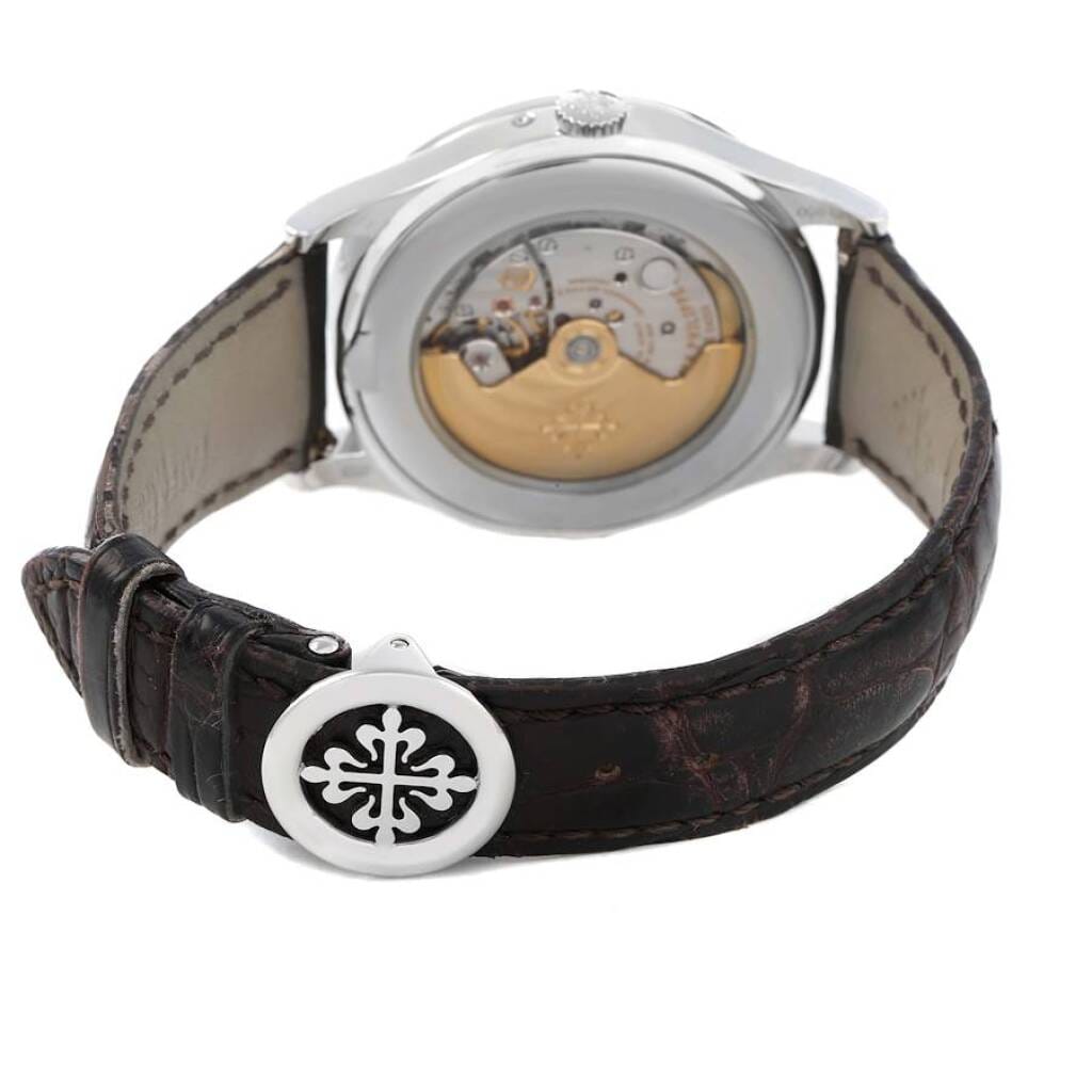 Complications (Reference 5496P-001). A 39.5mm platinum automatic wristwatch with date, day, month, moon phase, leap year, and perpetual calendar. 2012