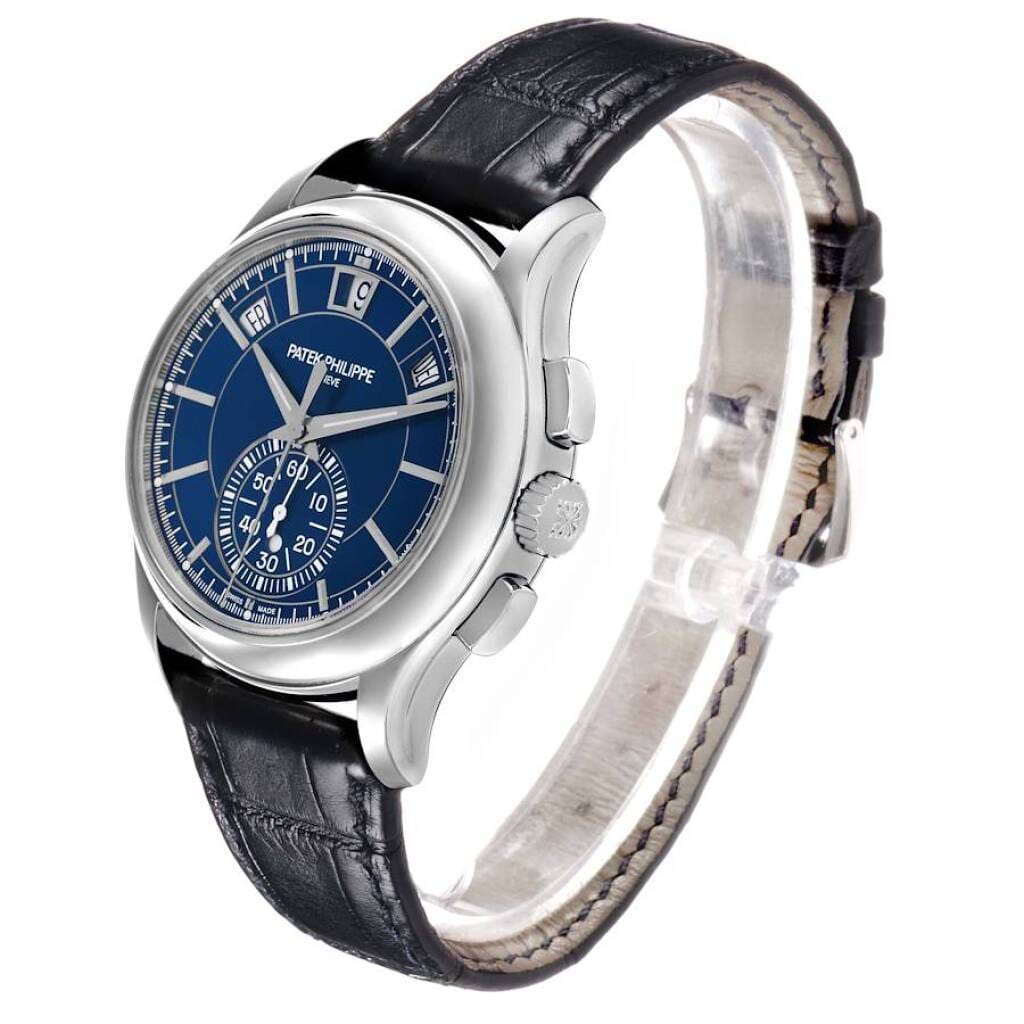 Complications (Reference 5905P-001). A 42mm platinum automatic wristwatch with date, day, month, chronograph, and annual calendar. 2022