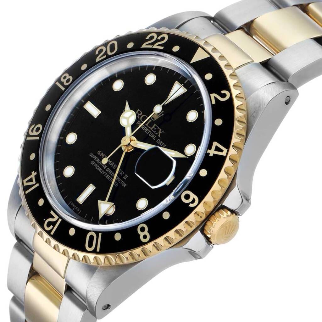 GMT-Master II (Reference 16713). A 40mm yellow gold stainless steel automatic wristwatch with date and dual time. Circa 1999-2000