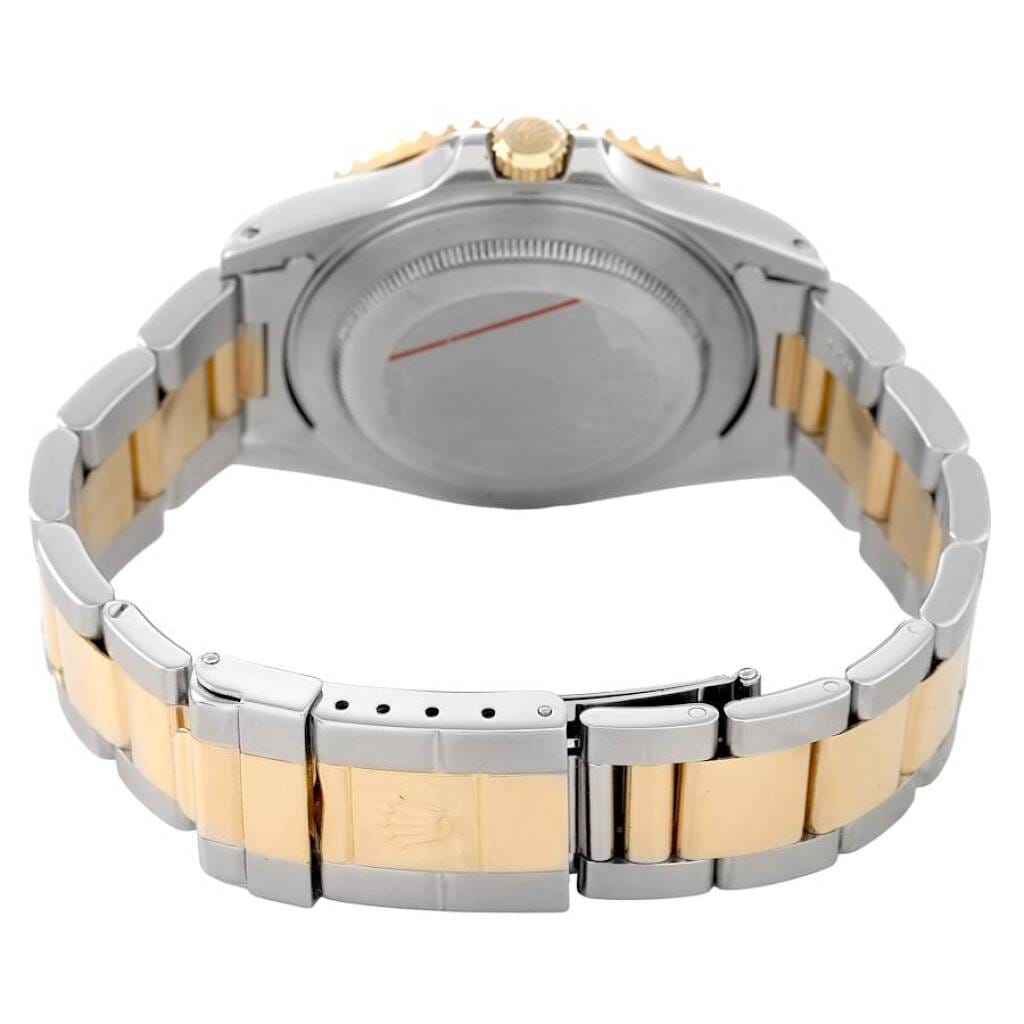 GMT-Master II (Reference 16713). A 40mm yellow gold stainless steel automatic wristwatch with date and dual time. Circa 1999-2000