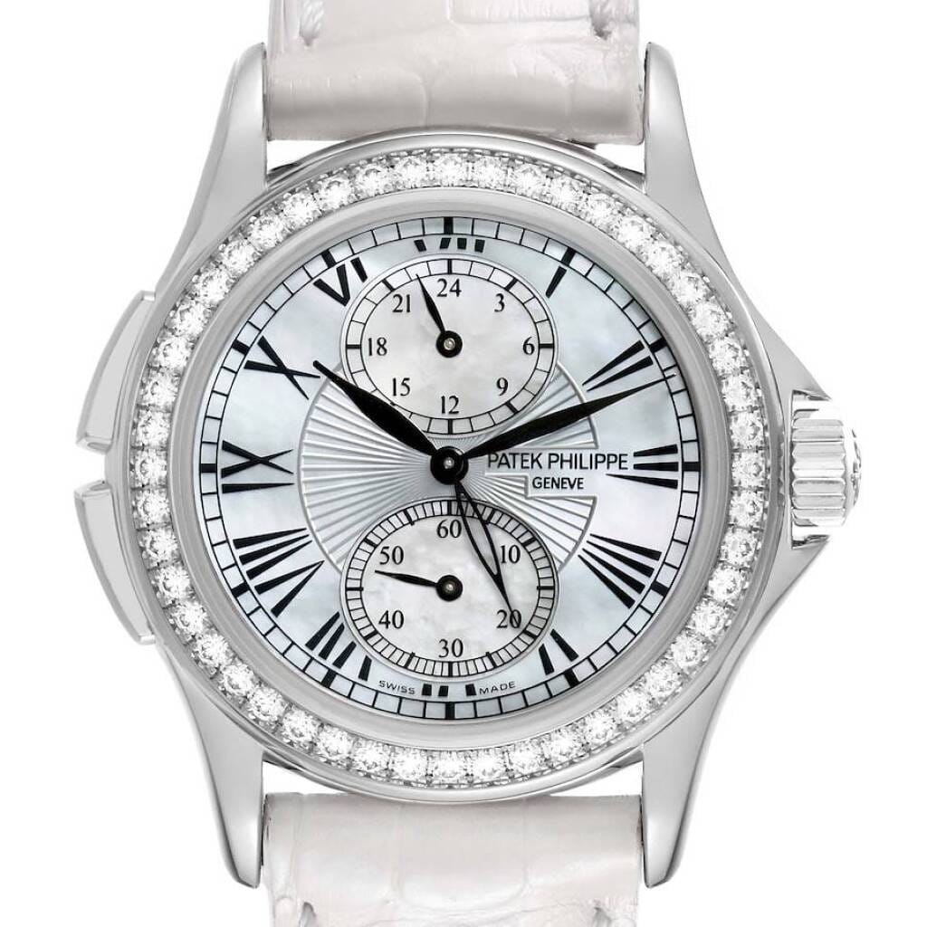 Calatrava Travel Time (Reference 4934G-001). A 35mm white gold diamond-set manual wind wristwatch with dual time.