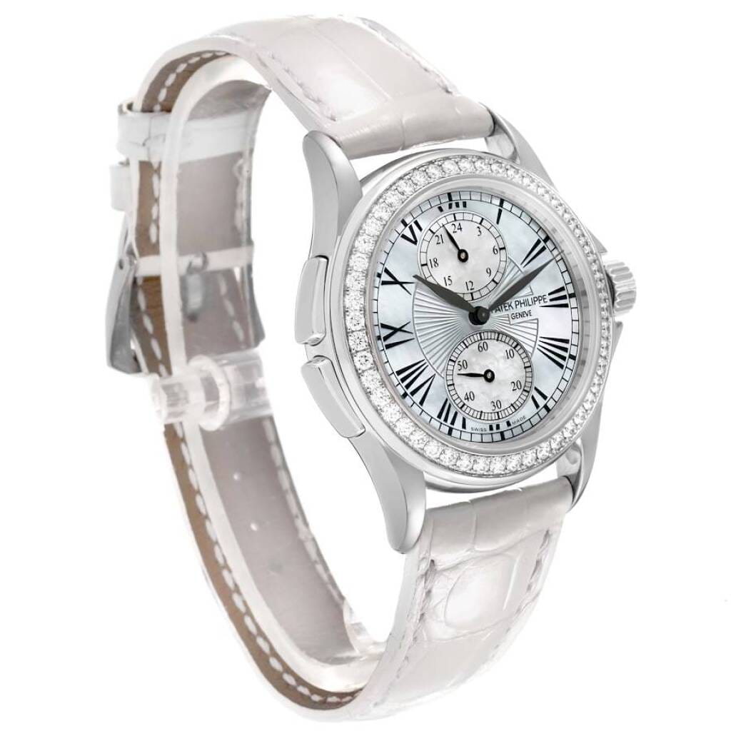 Calatrava Travel Time (Reference 4934G-001). A 35mm white gold diamond-set manual wind wristwatch with dual time.