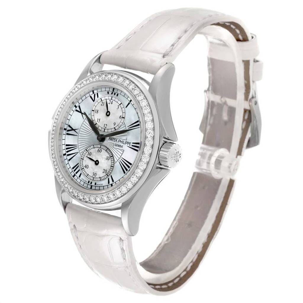 Calatrava Travel Time (Reference 4934G-001). A 35mm white gold diamond-set manual wind wristwatch with dual time.
