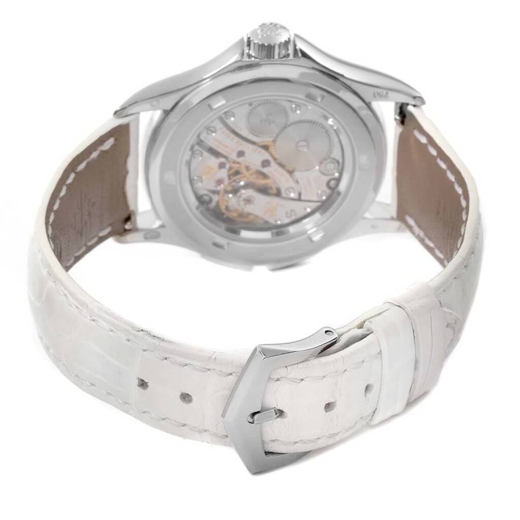 Calatrava Travel Time (Reference 4934G-001). A 35mm white gold diamond-set manual wind wristwatch with dual time.