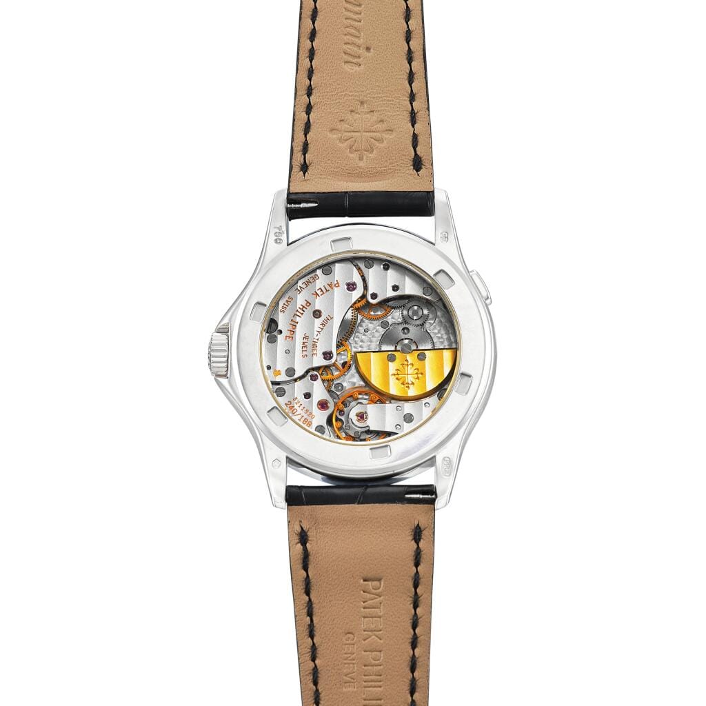 World Time (Reference 5110). A white gold automatic world time wristwatch. Circa 2002