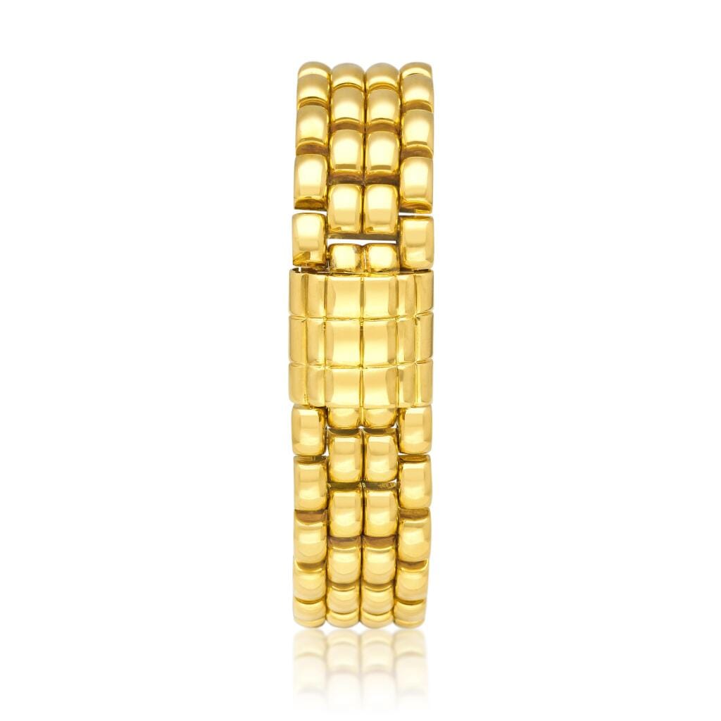 Rolex. A yellow gold manual wind bracelet watch with concealed dial. Circa 1948