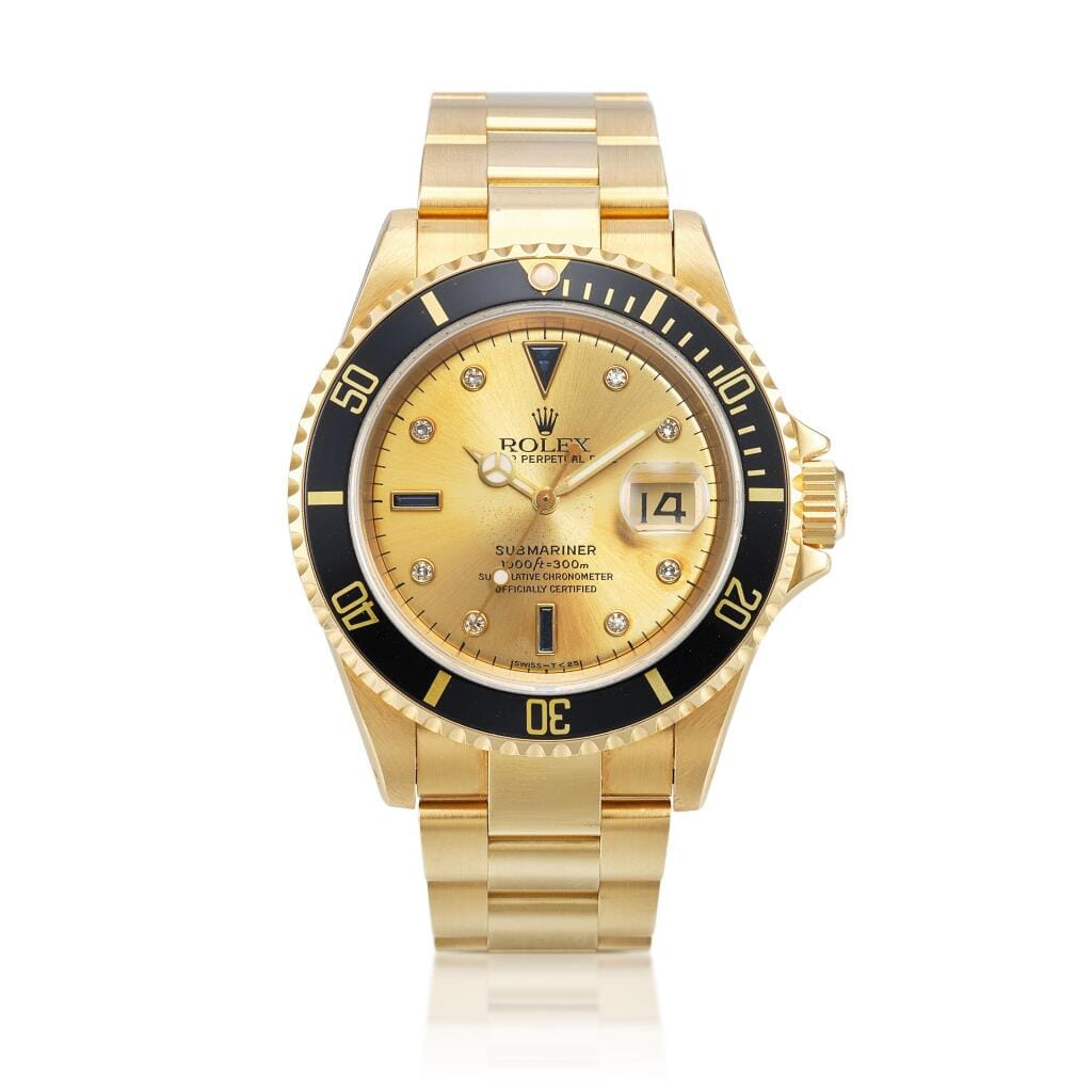 Submariner (Reference 16618). A yellow gold, diamond and sapphire-set automatic wristwatch with date and bracelet. Circa 1991