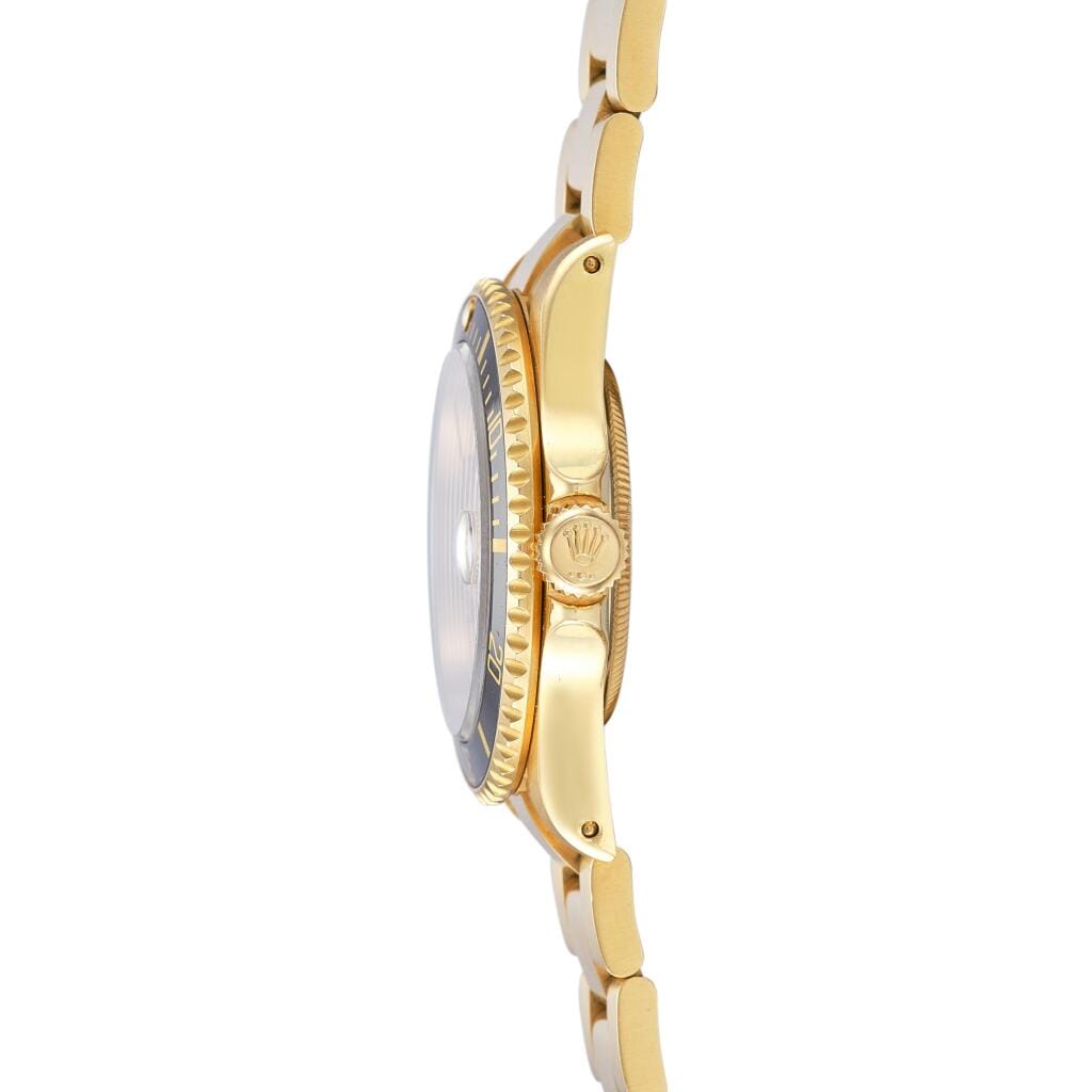Submariner (Reference 16618). A yellow gold, diamond and sapphire-set automatic wristwatch with date and bracelet. Circa 1991