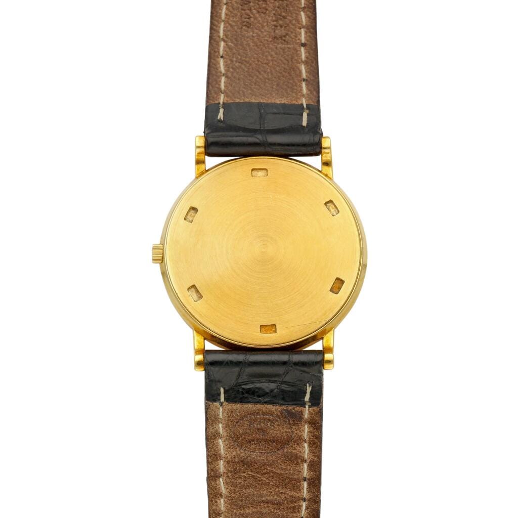 Calatrava (Reference 3520). A 32mm yellow gold manual wind wristwatch. 1990