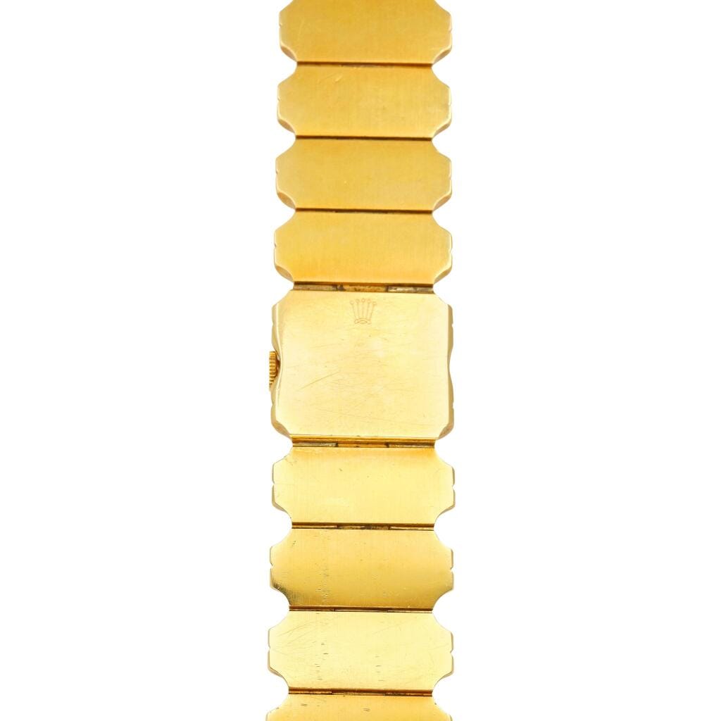 Precision (Reference 4615). A 21.5mm yellow gold manual wind bracelet watch with concealed dial. 1947