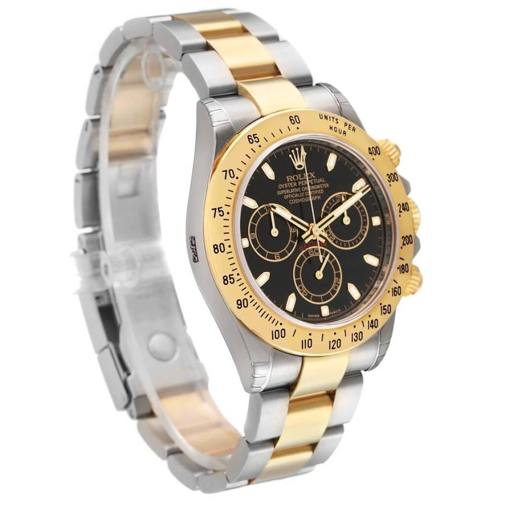Cosmograph Daytona NOS (Reference 116523). A 40mm yellow gold stainless steel automatic wristwatch with chronograph. 2008