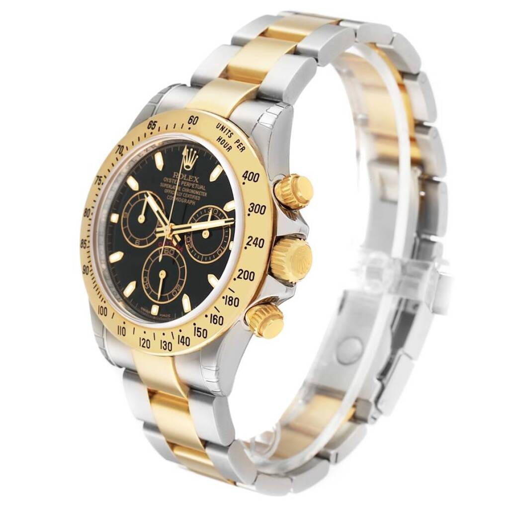 Cosmograph Daytona NOS (Reference 116523). A 40mm yellow gold stainless steel automatic wristwatch with chronograph. 2008