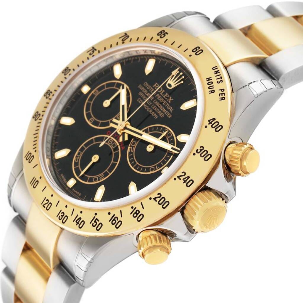 Cosmograph Daytona NOS (Reference 116523). A 40mm yellow gold stainless steel automatic wristwatch with chronograph. 2008