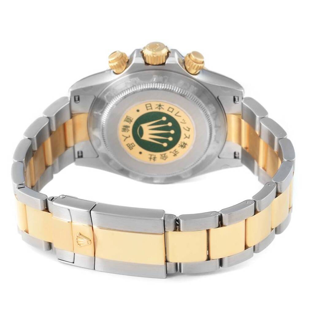 Cosmograph Daytona NOS (Reference 116523). A 40mm yellow gold stainless steel automatic wristwatch with chronograph. 2008