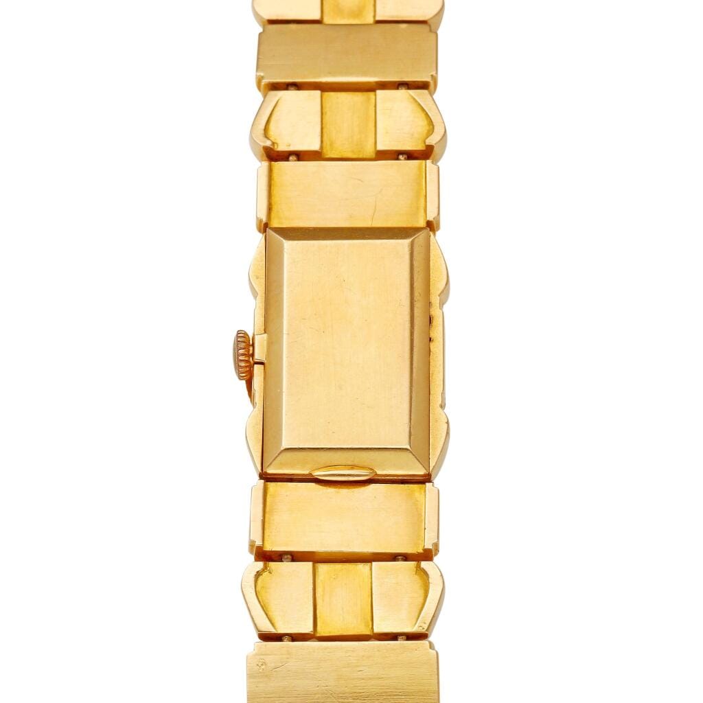 Patek Philippe & Co. A rose gold manual wind bracelet with concealed dial. Circa 1940