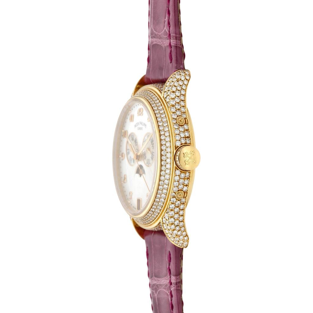 Complications (Reference 4937R-001). A 37mm rose gold diamond-set automatic wristwatch with date, day, month, moon phase, and annual calendar. 2013