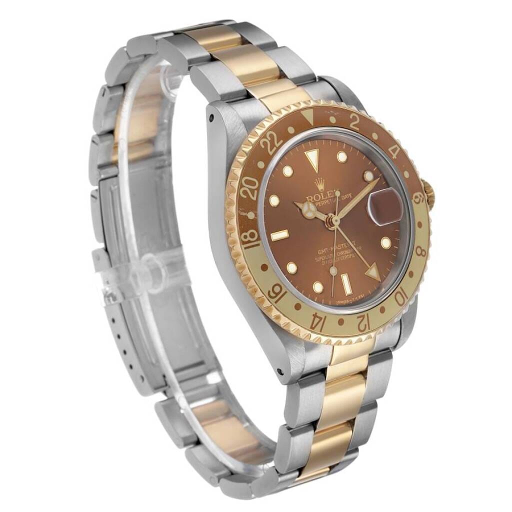 GMT-Master II 'Root Beer' (Reference 16713). A 40mm yellow gold stainless steel automatic wristwatch with date and dual time. 1991-1992