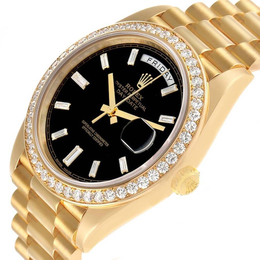 President Day-Date (Reference 228348). A 40mm yellow gold diamond-set automatic wristwatch with date and day.