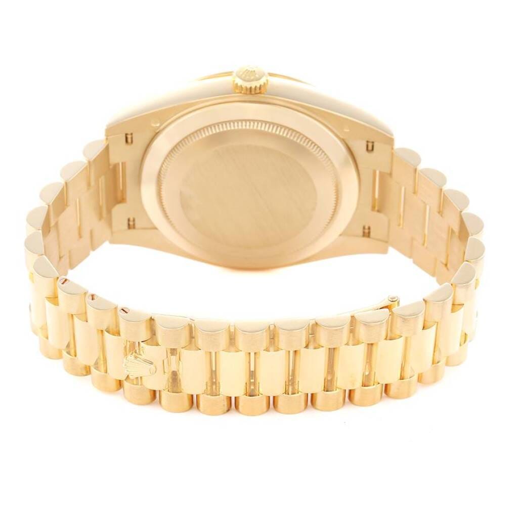 President Day-Date (Reference 228348). A 40mm yellow gold diamond-set automatic wristwatch with date and day.