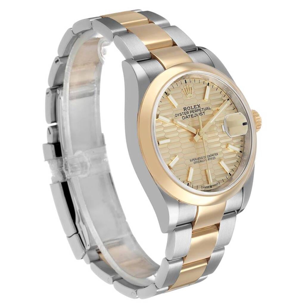 Datejust (Reference 126203). A 36mm yellow gold stainless steel automatic wristwatch with date. 2019
