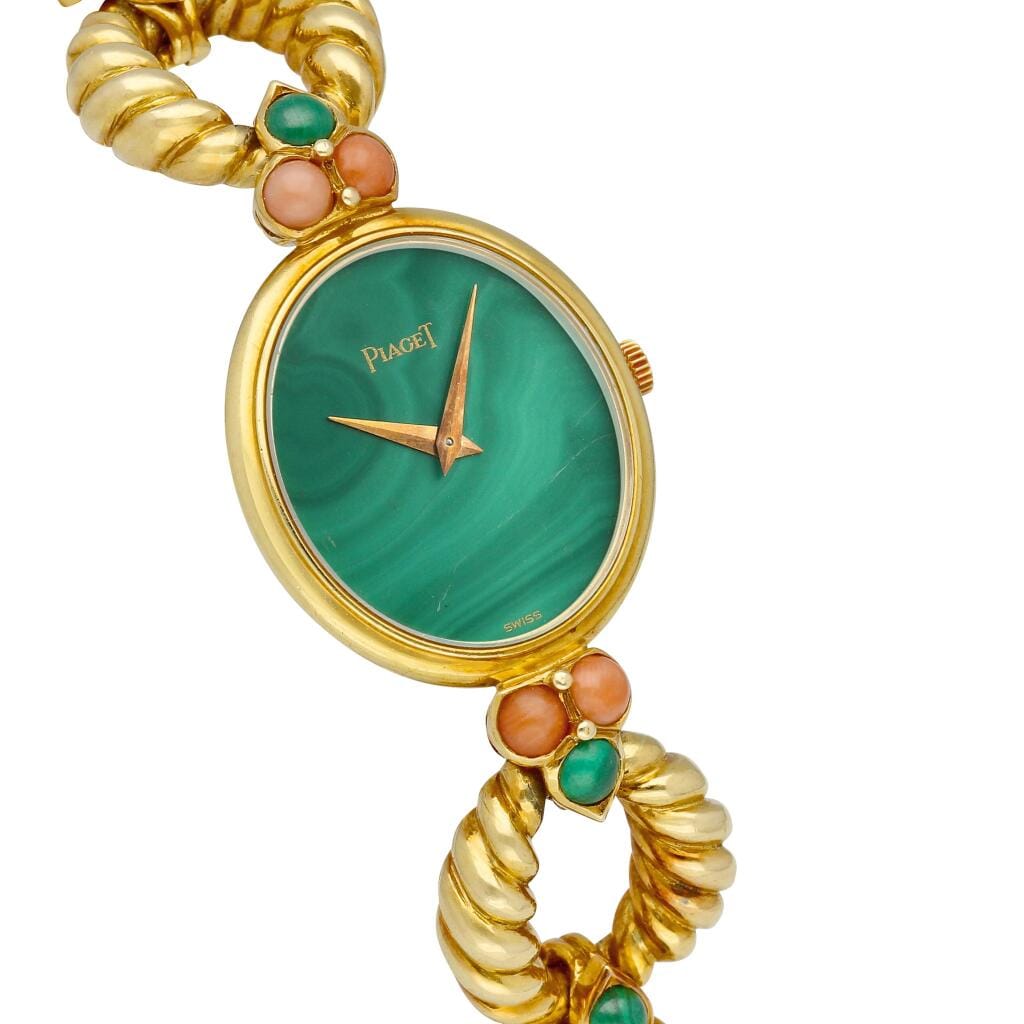 Piaget (Reference 94151 R21). A yellow gold, malachite and coral-set mechanical bracelet watch with malachite dial. Circa 1975