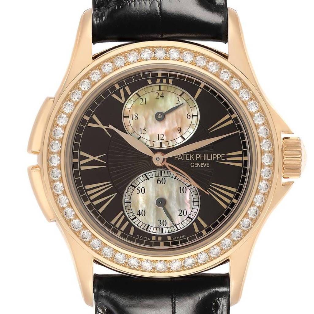 Calatrava Travel Time (Reference 4934R-001). A 35mm rose gold diamond-set manual wind wristwatch with dual time.