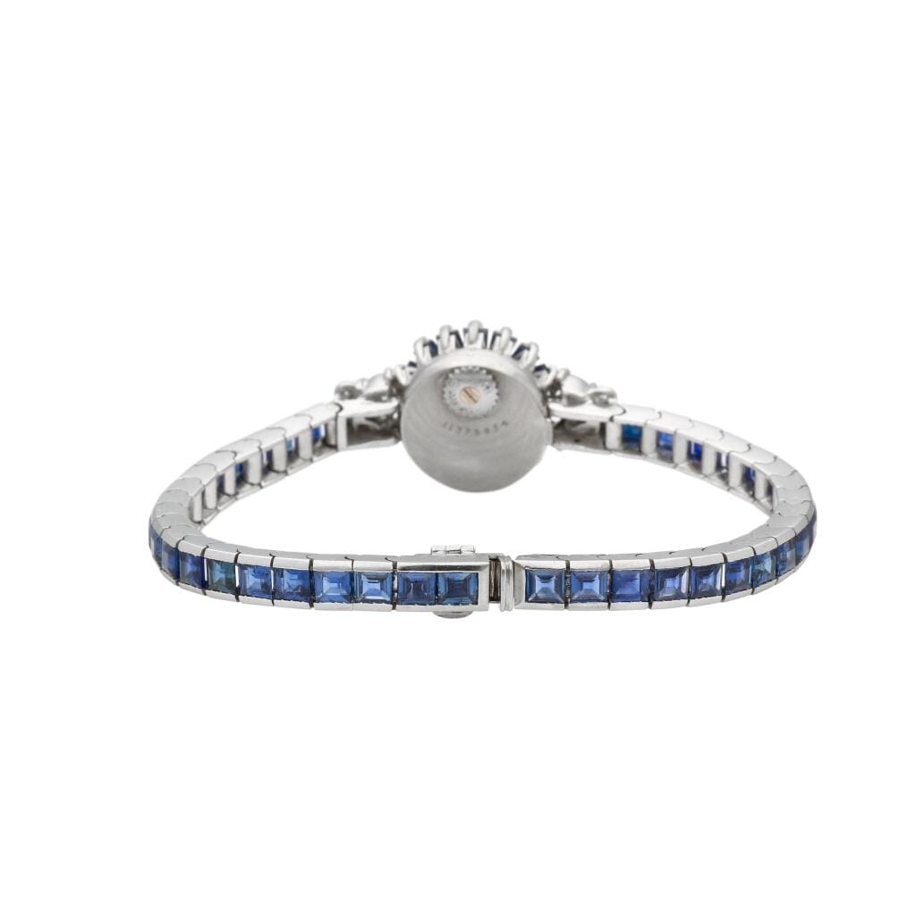 Omega. A white gold, diamond and sapphire-set manual wind bracelet watch. Circa 1960