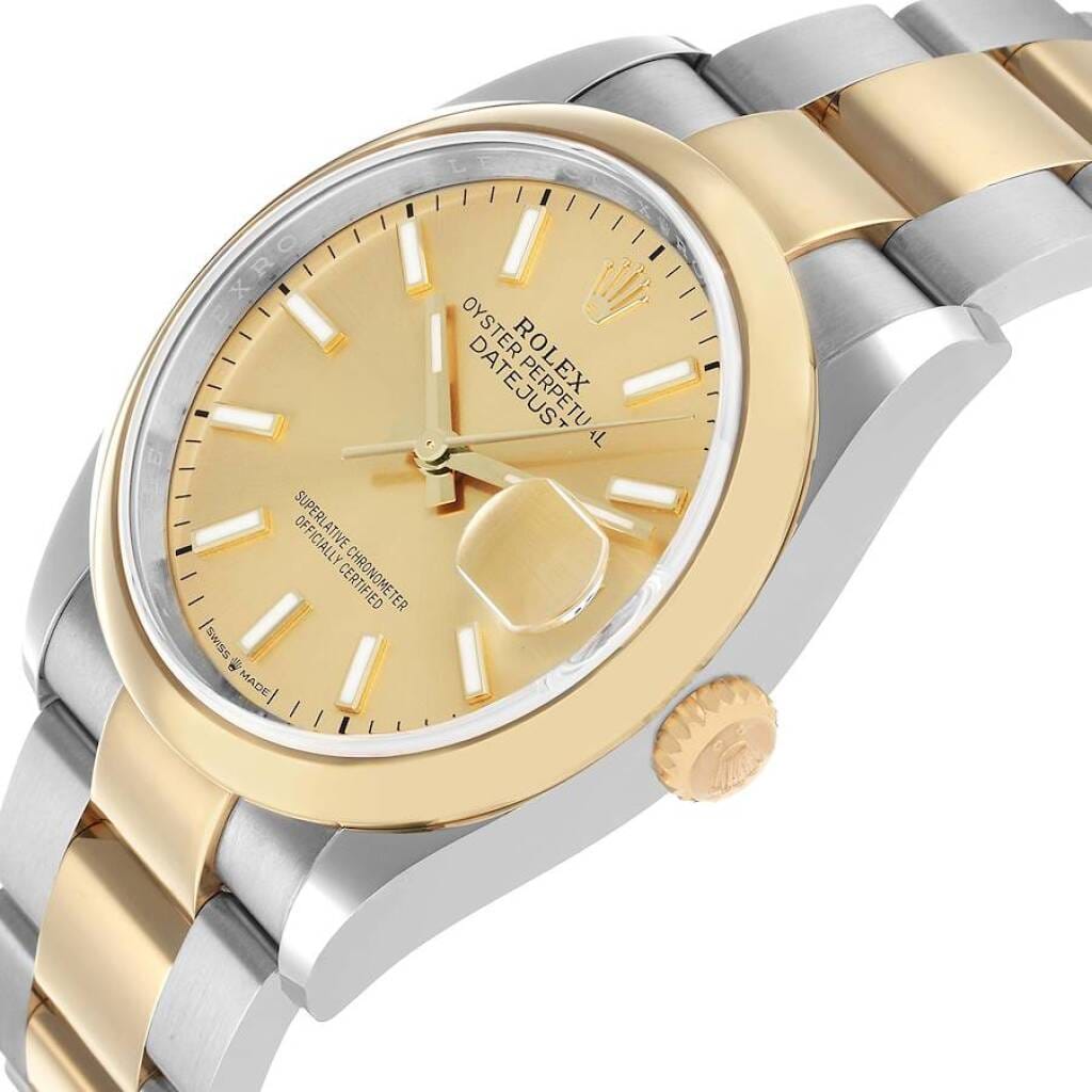Datejust (Reference 126203). A 36mm yellow gold stainless steel automatic wristwatch with date. 2024