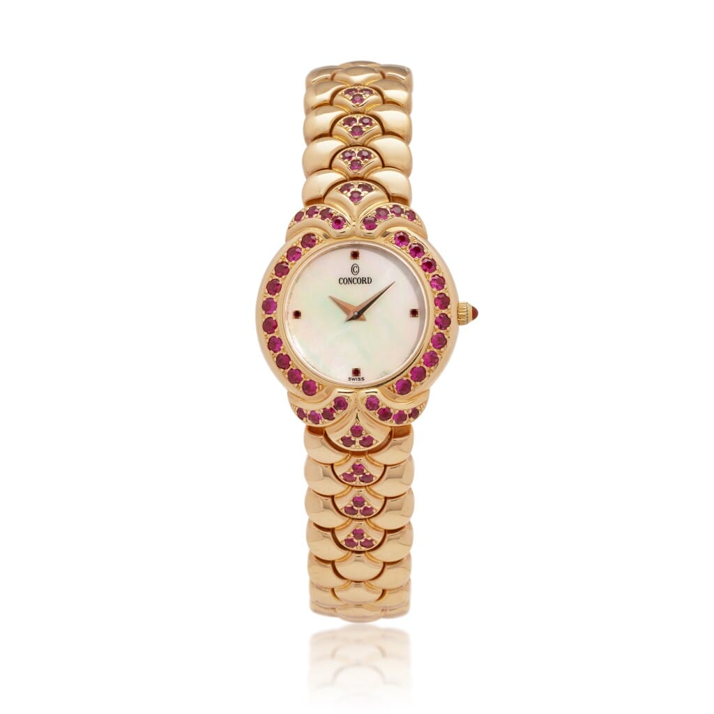 High Jewelry Royale Ruby Special Edition (Reference 54-25-249 SR). A 26mm yellow gold gem-set quartz wristwatch.