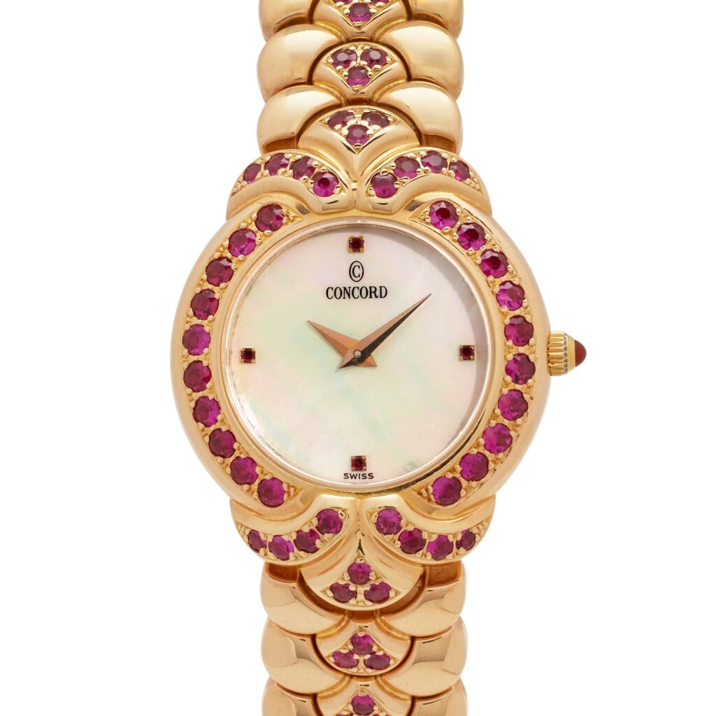 High Jewelry Royale Ruby Special Edition (Reference 54-25-249 SR). A 26mm yellow gold gem-set quartz wristwatch.