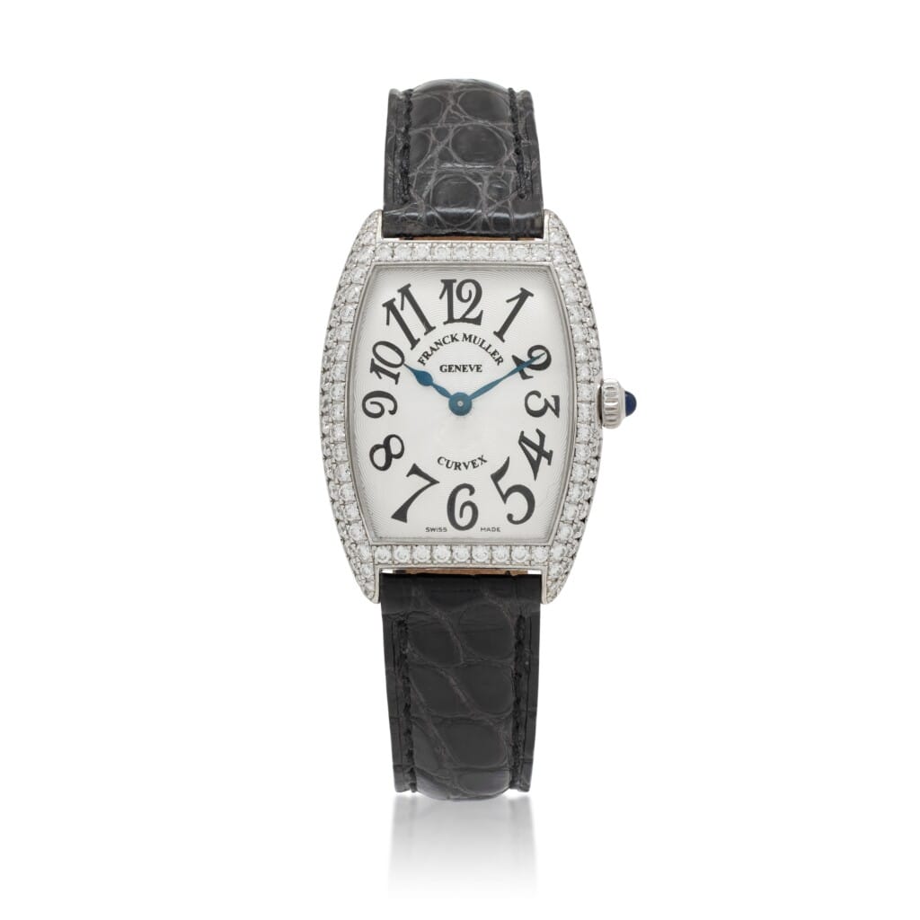 Cintrée Curvex (Reference 1752 QZ D). A 35mm white gold diamond-set quartz wristwatch.
