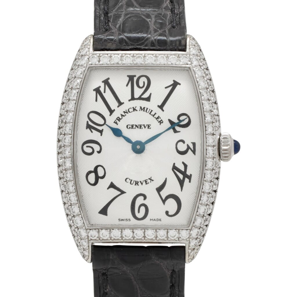 Cintrée Curvex (Reference 1752 QZ D). A 35mm white gold diamond-set quartz wristwatch.