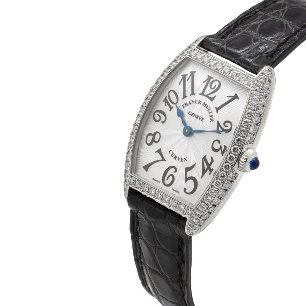 Cintrée Curvex (Reference 1752 QZ D). A 35mm white gold diamond-set quartz wristwatch.