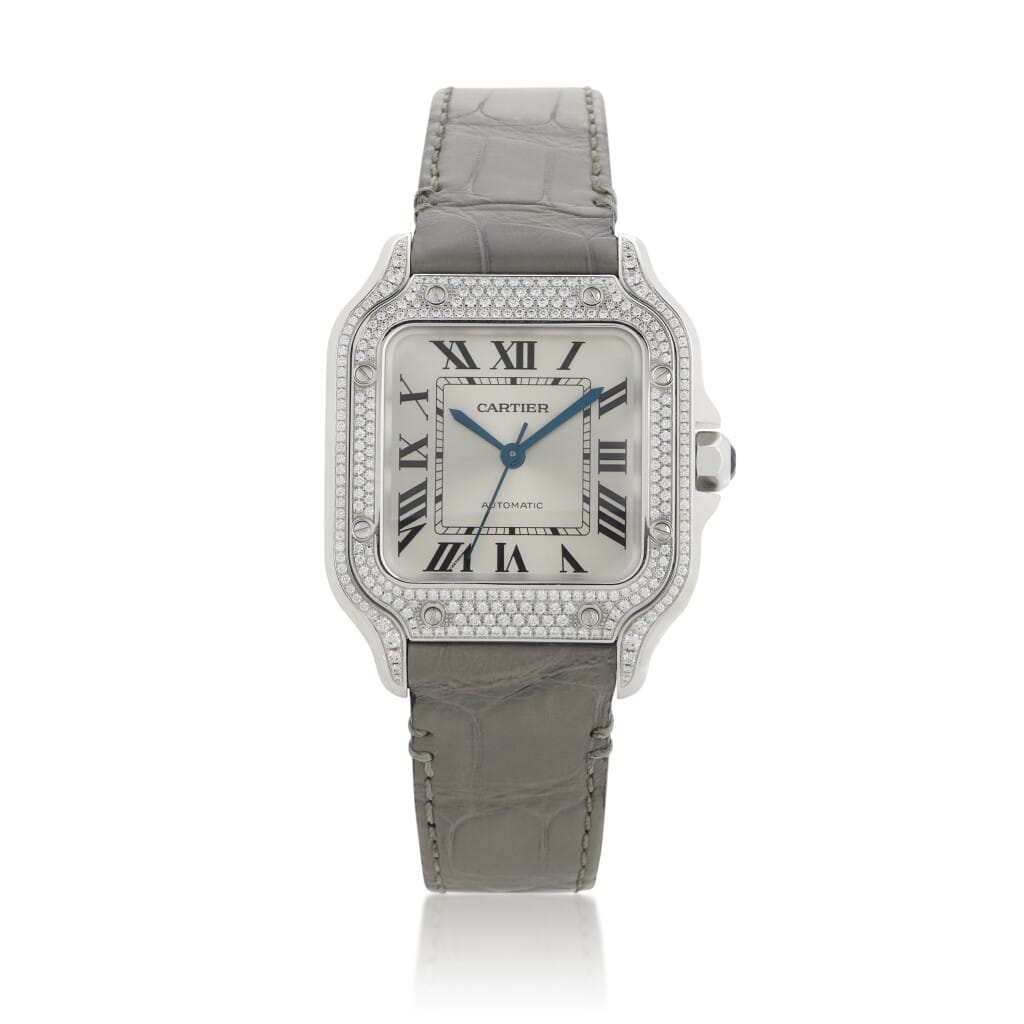 Santos de Cartier Medium (Reference WJSA0014). A 35.1mm white gold diamond set automatic wristwatch.