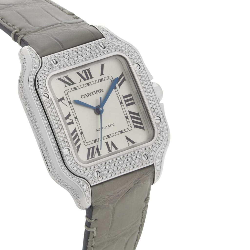 Santos de Cartier Medium (Reference WJSA0014). A 35.1mm white gold diamond set automatic wristwatch.