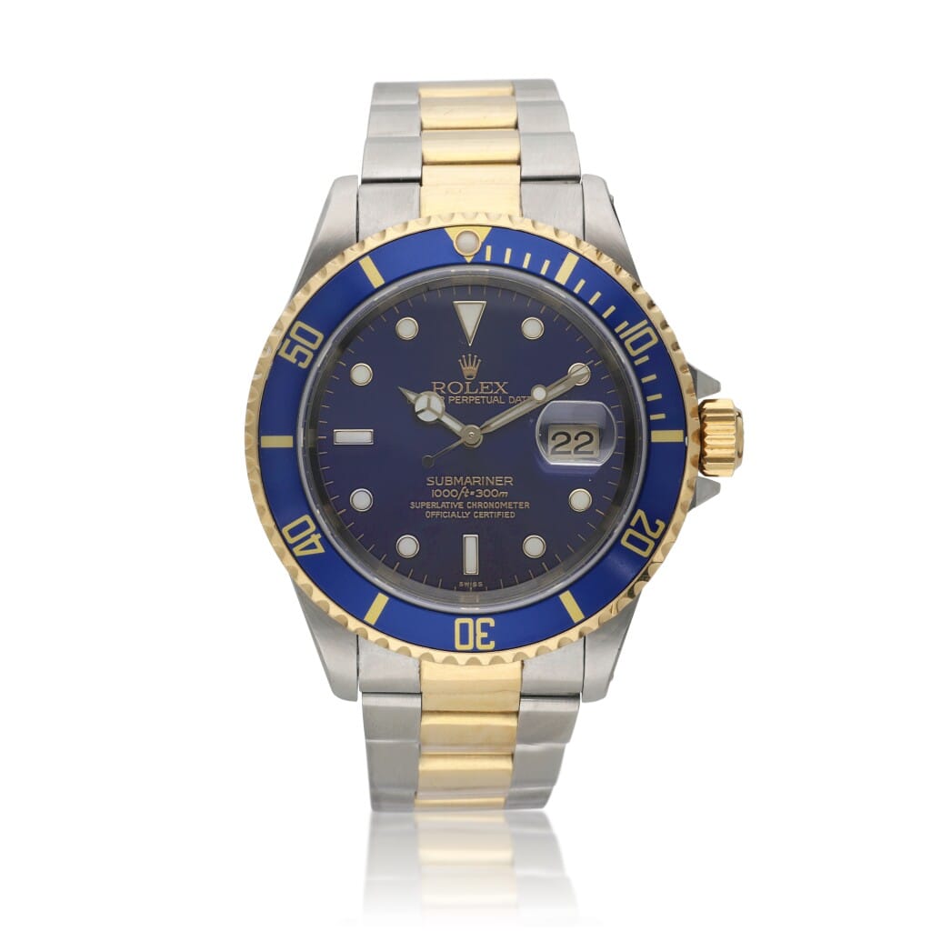 Submariner (Reference 16613). A 40mm yellow gold stainless steel automatic wristwatch with date. 1999