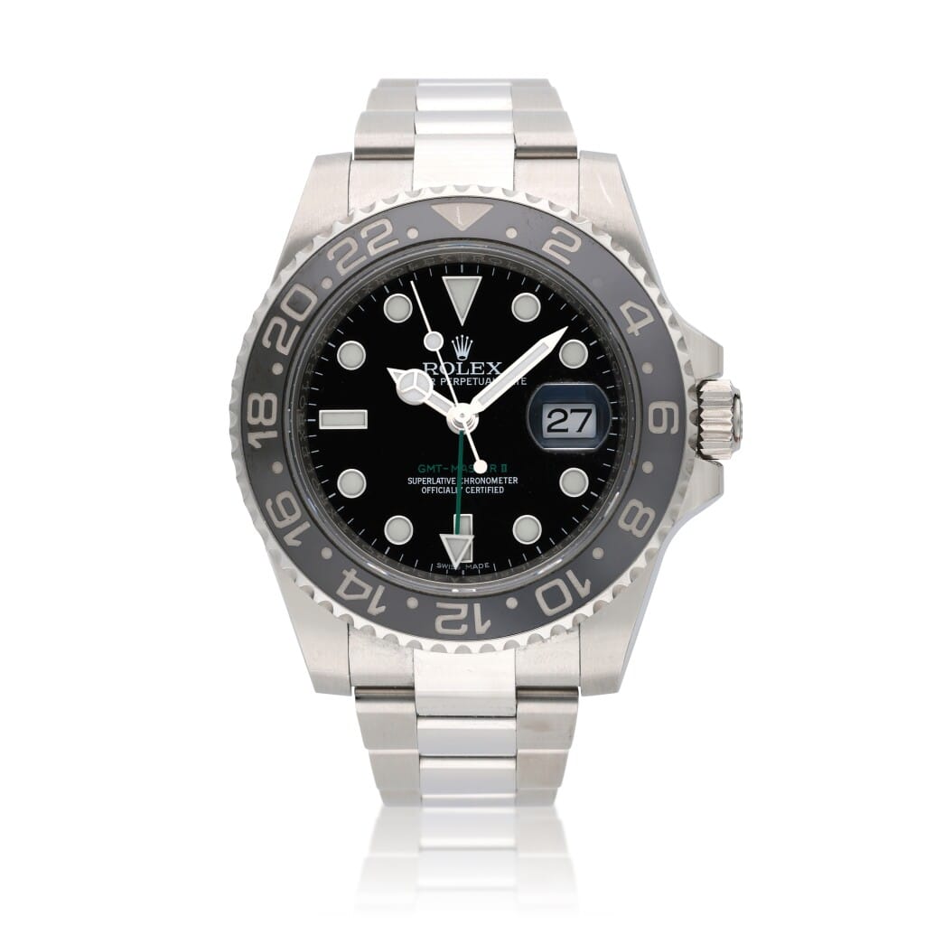 GMT-Master II (Reference 116710). A 40mm stainless steel automatic wristwatch with date.