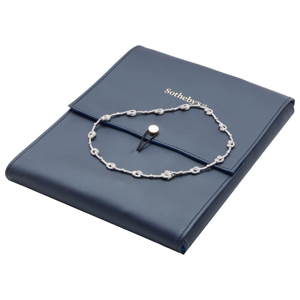 Platinum and Diamond Love Knot Necklace