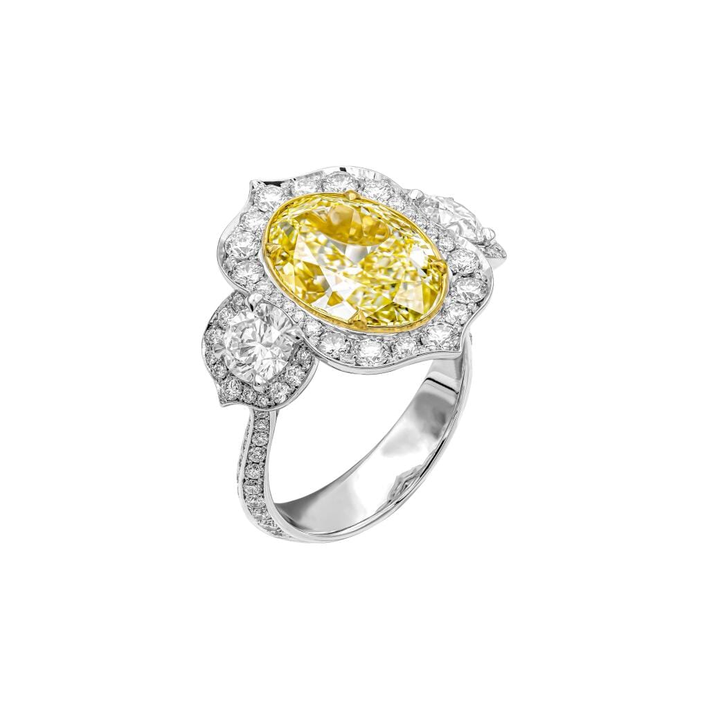 Platinum, Gold, 6.02ct Oval Cut Fancy Light Yellow Diamond and Diamond Engagement Ring