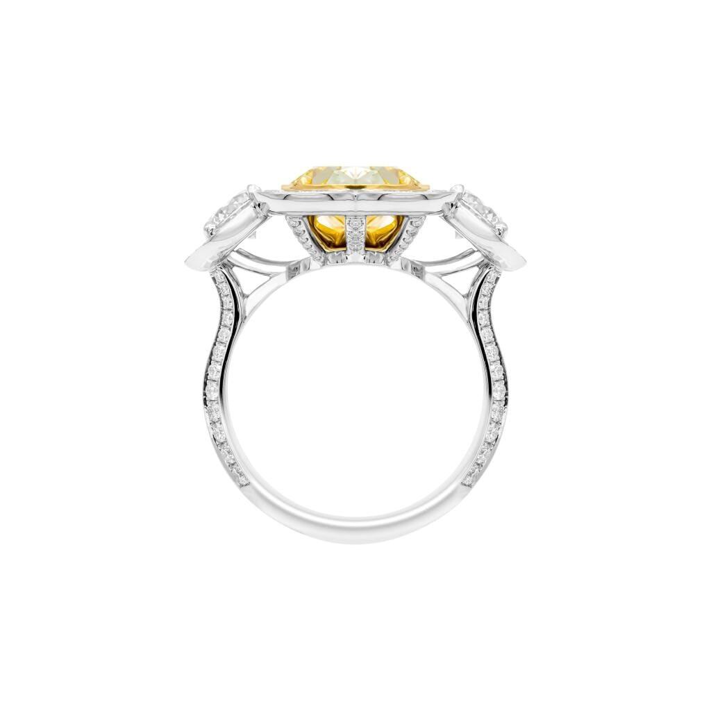 Platinum, Gold, 6.02ct Oval Cut Fancy Light Yellow Diamond and Diamond Engagement Ring