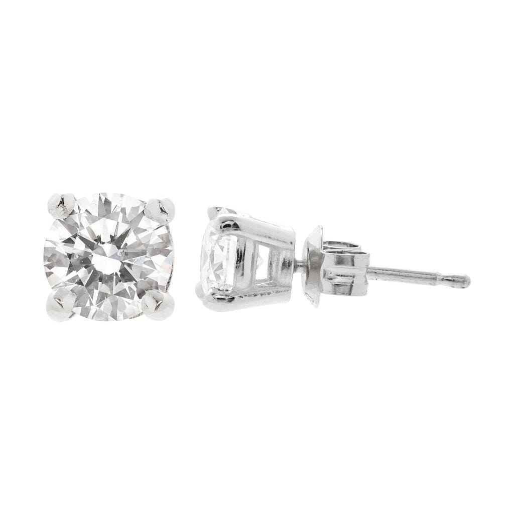Platinum and 1.04ctw Round Brilliant Cut Diamond Stud Earrings