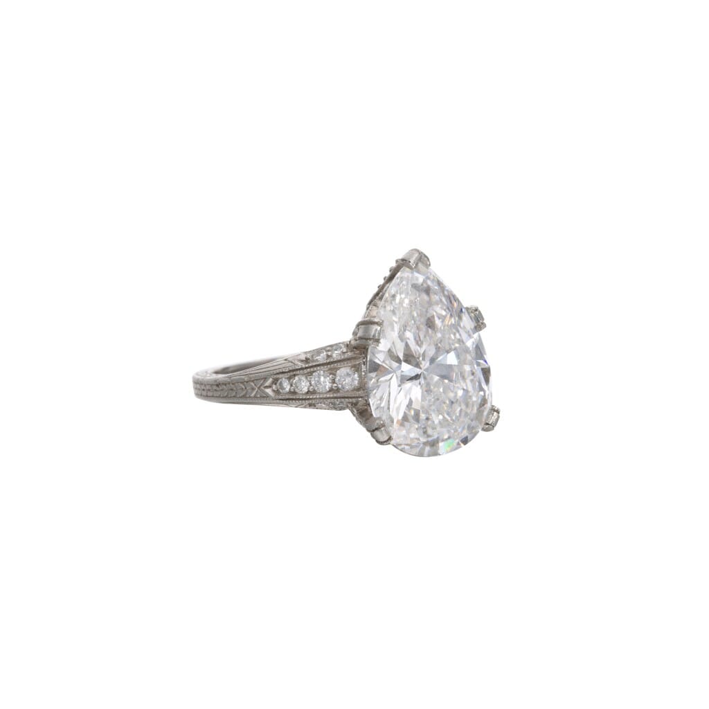 Platinum, 4.97ct Pear Shape Diamond and Diamond Engagement Ring