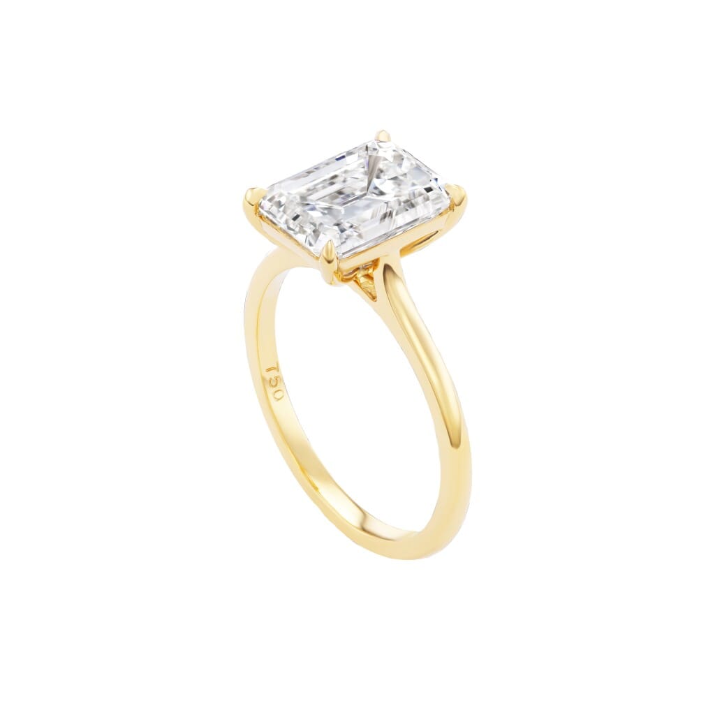 Gold and 3.05ct Emerald Cut Diamond Engagement Ring